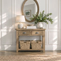 Oak  two drawer console table with low shelf and baskets for storage.
