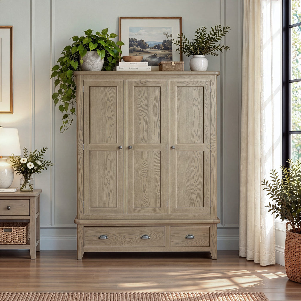 Large 3 door wardrobe in oak.