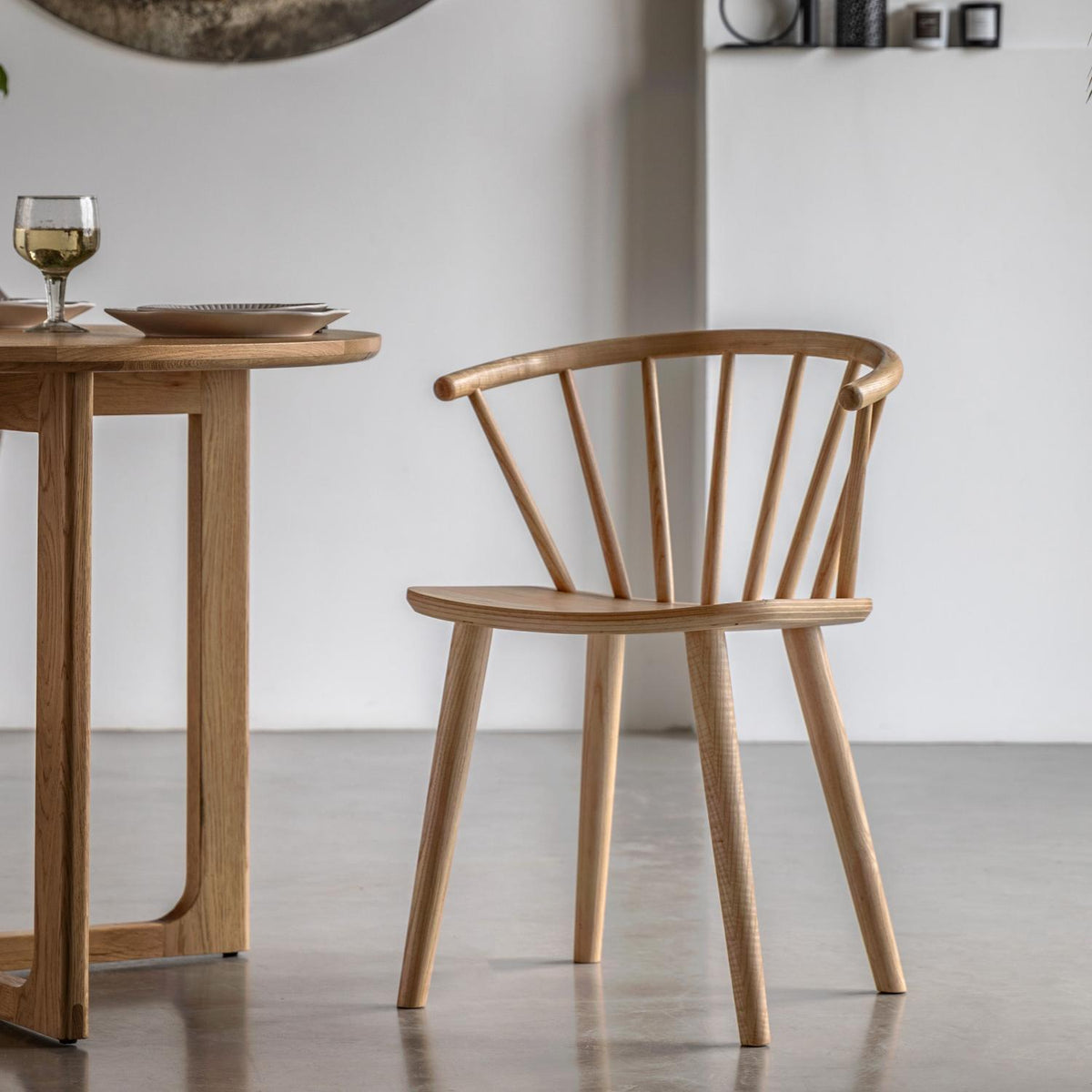 Wooden chair and dining table in a minimalistic room