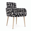 Sloane dining chair with arms in black and cream geometric pattern boucle fabric with natural wooden legs