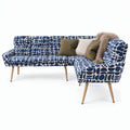 Sloane corner bench in blue and cream geometric pattern boucle fabric with natural wooden legs