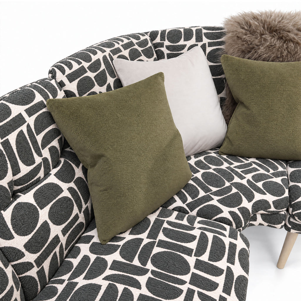 Close-up of the Sloane corner bench seat and cushions in sage geometric pattern fabric