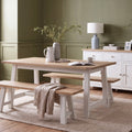 Trestle dining table in painted and oak finish