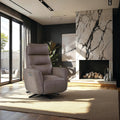 A modern taupe upholstered recliner chair with a black swivel base, placed in a stylish contemporary living room with a marble fireplace, large windows, and a beige rug.