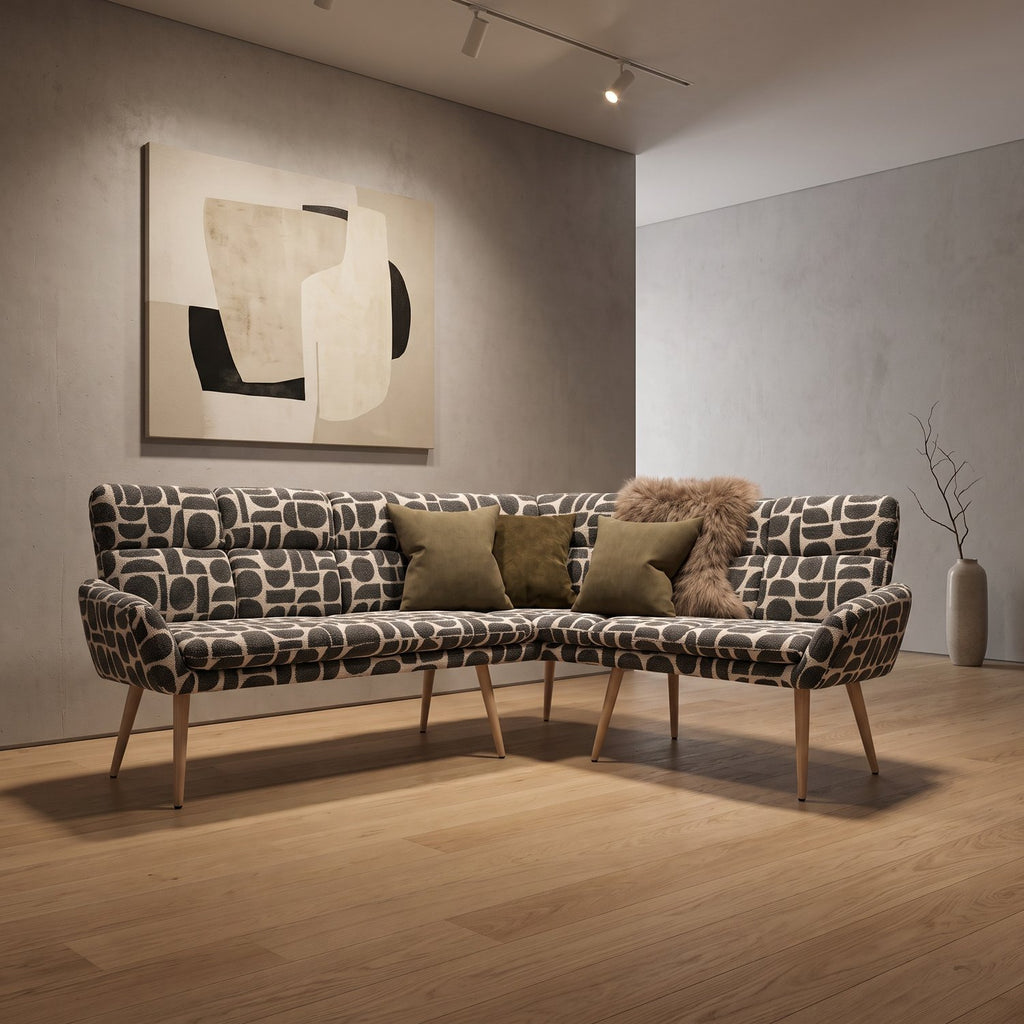 Front view of the Sloane corner bench in sage geometric pattern boucle style fabric on beech-wrapped metal legs