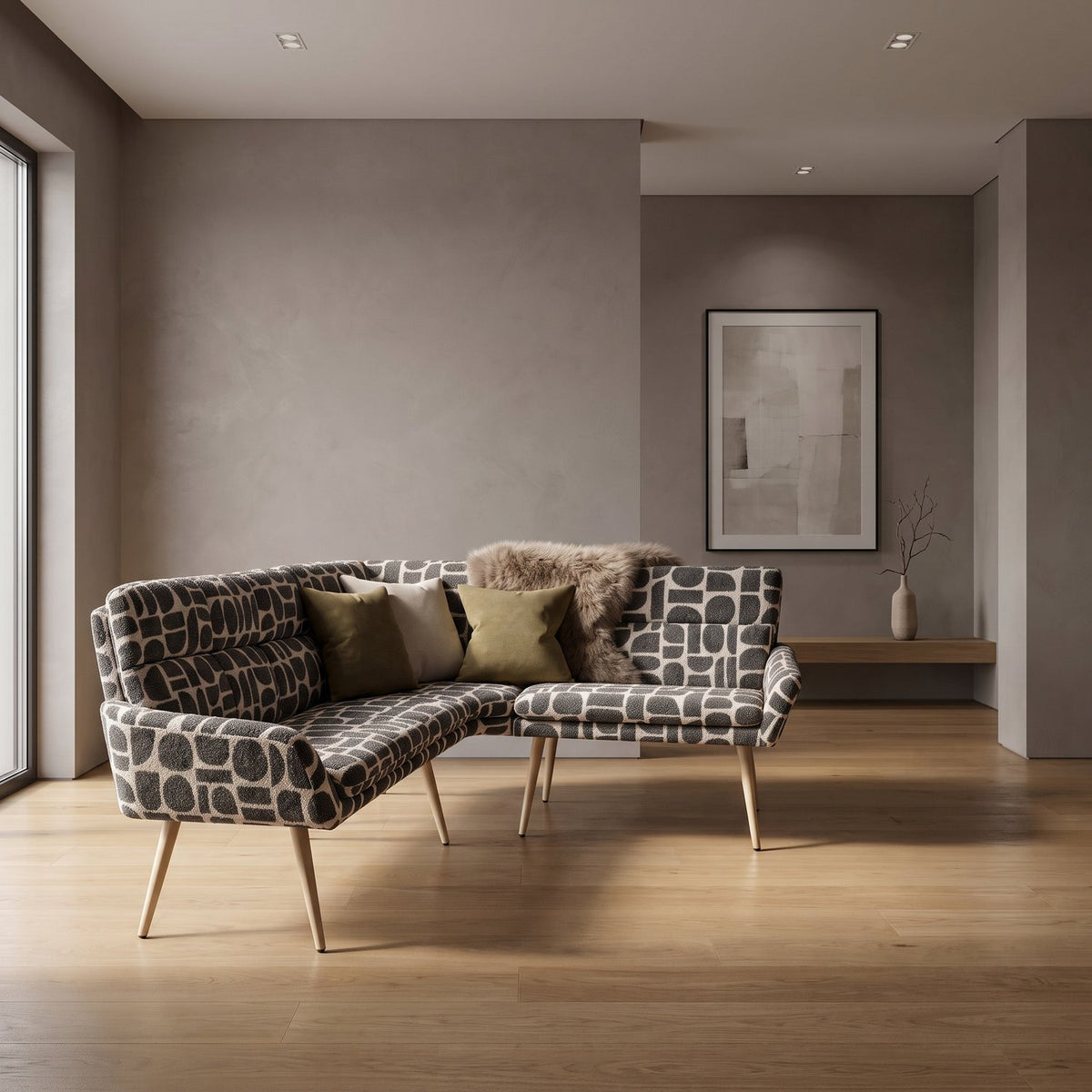 Sloane corner bench in sage geometric pattern boucle style fabric with faux fur throw on an oak floor