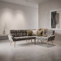 Sloane L-shaped corner bench in sage and cream geometric pattern boucle style fabric with olive cushions in a bright room