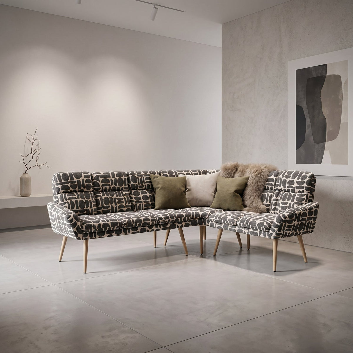 Sloane L-shaped corner bench in sage and cream geometric pattern boucle style fabric with olive cushions in a bright room