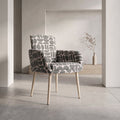 Sloane dining chair with arms in sage and cream geometric pattern boucle style fabric on beech-wrapped metal legs