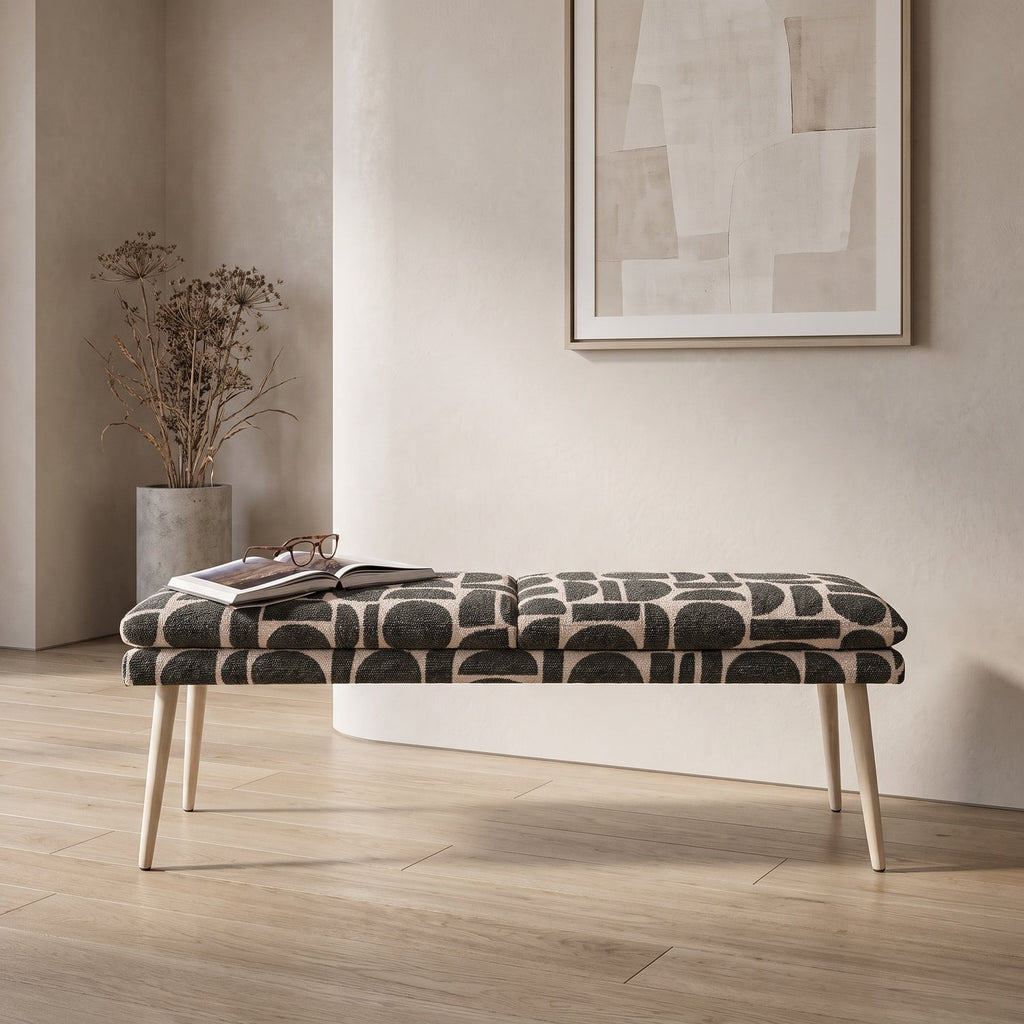 Sloane 140cm flat bench in sage geometric pattern boucle style fabric on beech-wrapped metal legs on an oak floor