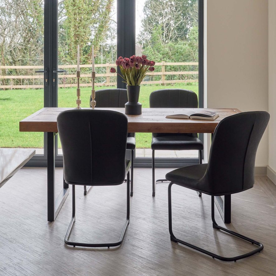 An image of Adelaide 180cm Dining Table with 4 Firenza Chairs in Black